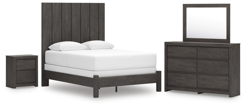 Ashley Furniture Fraluna bedroom set with a modern bed frame, matching nightstands, and a sleek dresser in a contemporary bedroom setting