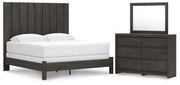Ashley Furniture Fraluna bedroom set with a modern bed frame, matching nightstands, and stylish bedroom decor in a cozy room setting.