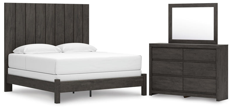 Ashley Furniture Fraluna bedroom set with a modern bed frame, matching nightstands, and stylish bedroom decor in a cozy room setting.