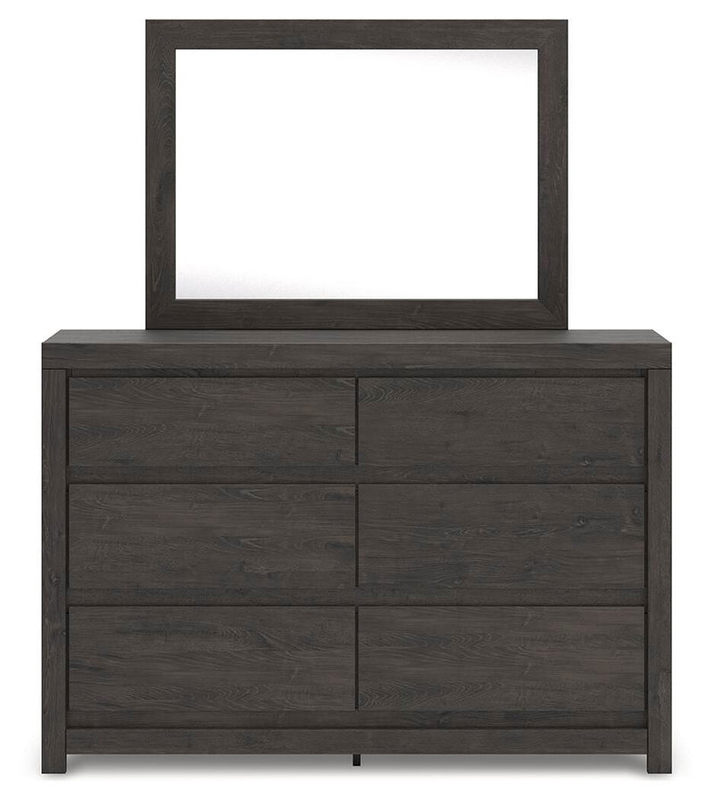 Ashley Furniture Fraluna bedroom set with a modern bed frame and matching furniture, shown from a front head-on view.