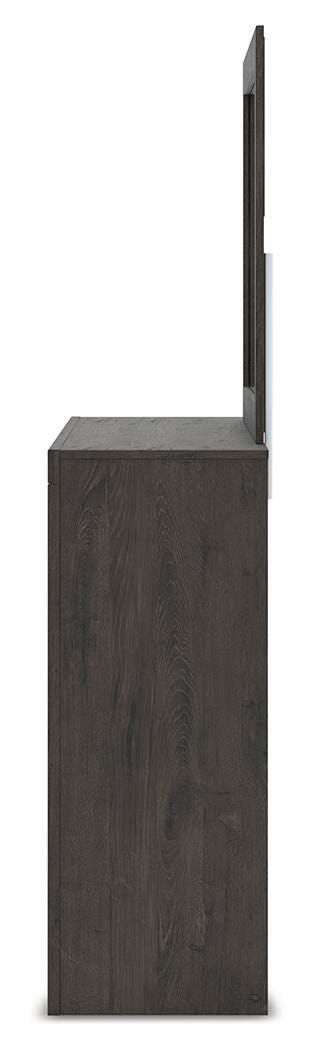 Ashley Furniture Fraluna bedroom set with a modern bed frame, matching nightstands, and a cozy, stylish bedroom decor setup.