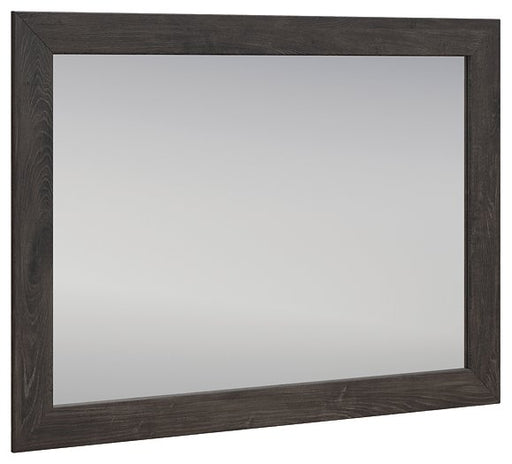 Ashley Furniture Fraluna bedroom mirror with a sleek, modern design, angled view showing its stylish frame and reflective surface.