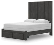 Ashley Furniture Fraluna bedroom set featuring a bed frame, nightstands, and dresser in a modern design, shown from an angled view.