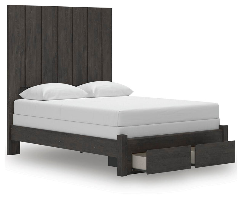 Ashley Furniture Fraluna bedroom set featuring a bed, matching nightstands, and dresser in a modern bedroom arrangement.
