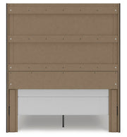 Ashley Furniture Fraluna bedroom set with a large upholstered bed, matching nightstands, and a dresser in a modern bedroom design.