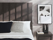 Ashley Furniture Fraluna bedroom set featuring a bed, nightstands, and dresser with modern wood finish and elegant design details.