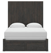 Ashley Furniture Fraluna bedroom set with a headboard and matching furniture in a cozy bedroom scene