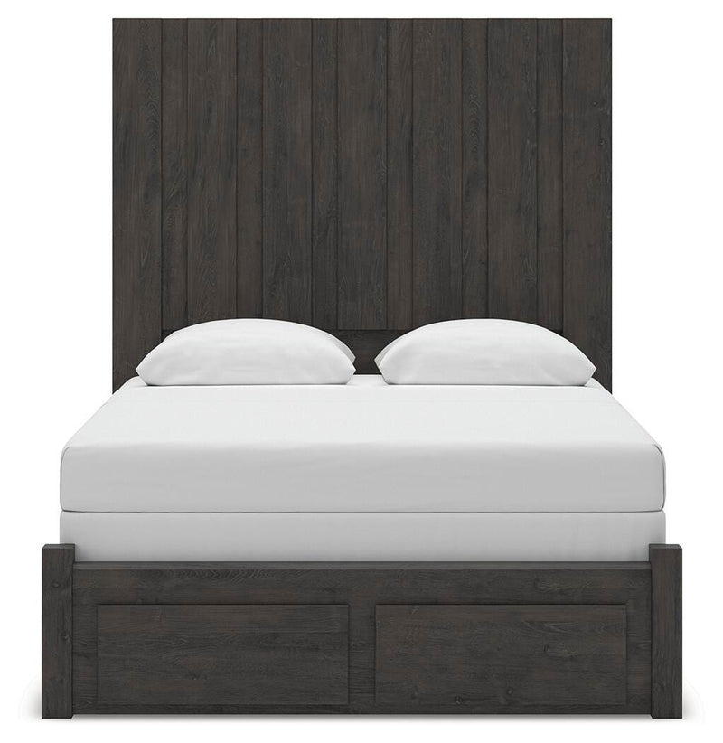Ashley Furniture Fraluna bedroom set with a headboard and matching furniture in a cozy bedroom scene