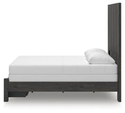 Ashley Furniture Fraluna bedroom set with a modern bed frame, matching nightstands, and a stylish bedroom decor arrangement.