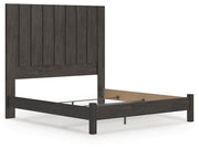 Ashley Furniture Fraluna bedroom set with a modern bed frame, matching nightstands, and a coordinated dresser in a stylish bedroom.