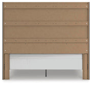 Ashley Furniture Fraluna bedroom set with a bed, nightstands, and dresser, featuring a modern design in a cozy bedroom setting.