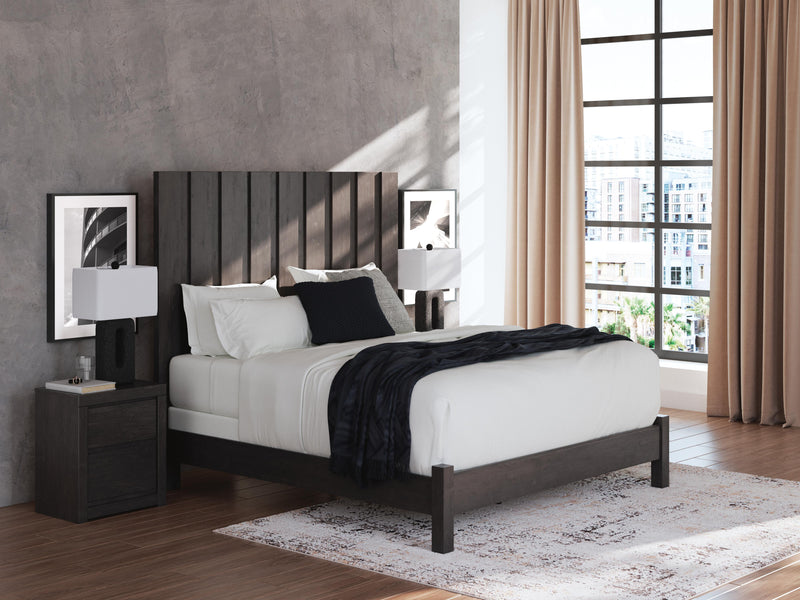 Ashley Furniture Fraluna bedroom set featuring a bed, dresser, and nightstands in a modern design with neutral finishes.
