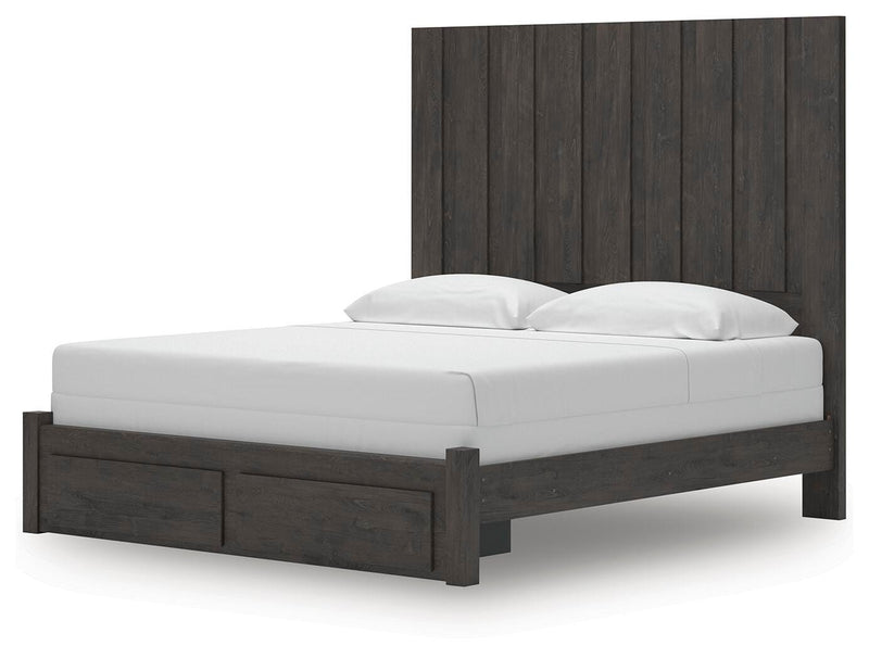 Ashley Furniture Fraluna bedroom set with a modern bed frame, nightstands, and matching dresser in a stylish bedroom arrangement.