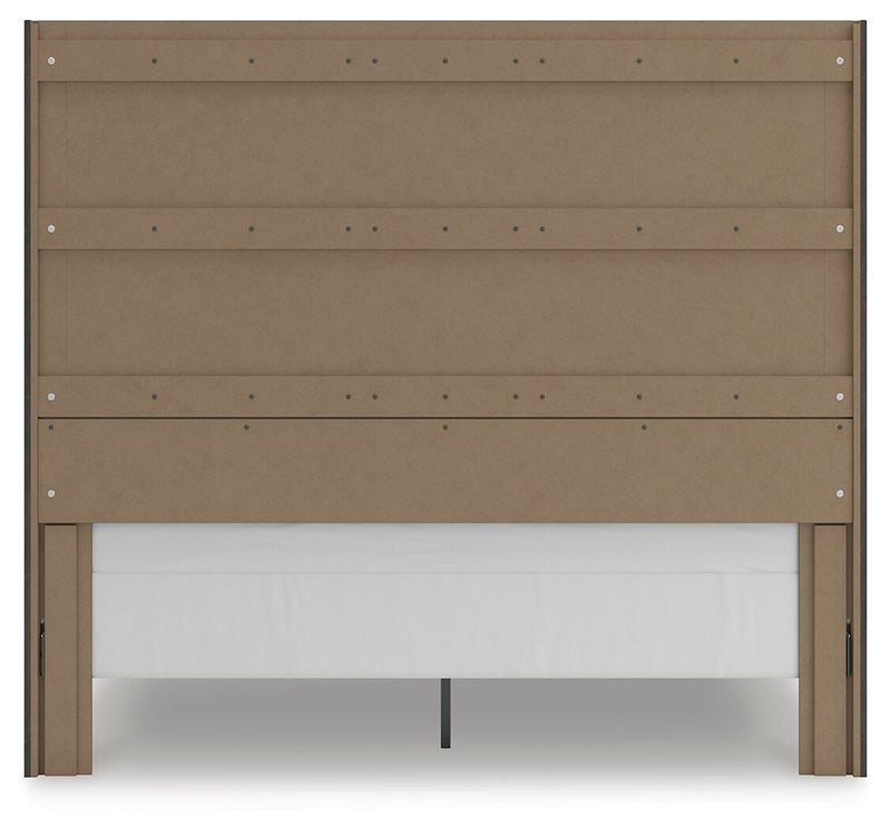 Ashley Furniture Fraluna bedroom set featuring a bed, dresser, and nightstands with modern design and neutral wood finish.