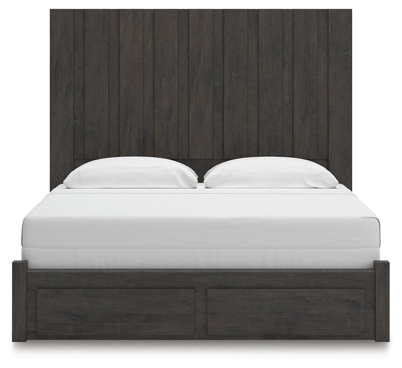 Ashley Furniture Fraluna bedroom set with a headboard, nightstands, and matching furniture in a modern bedroom scene.