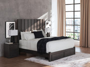 Ashley Furniture Fraluna bedroom set with a bed, matching nightstands, and dresser in a modern bedroom style.