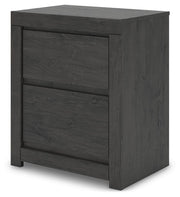 Ashley Furniture Fraluna bedroom set with a bed, matching nightstands, and dresser in a modern bedroom decor.
