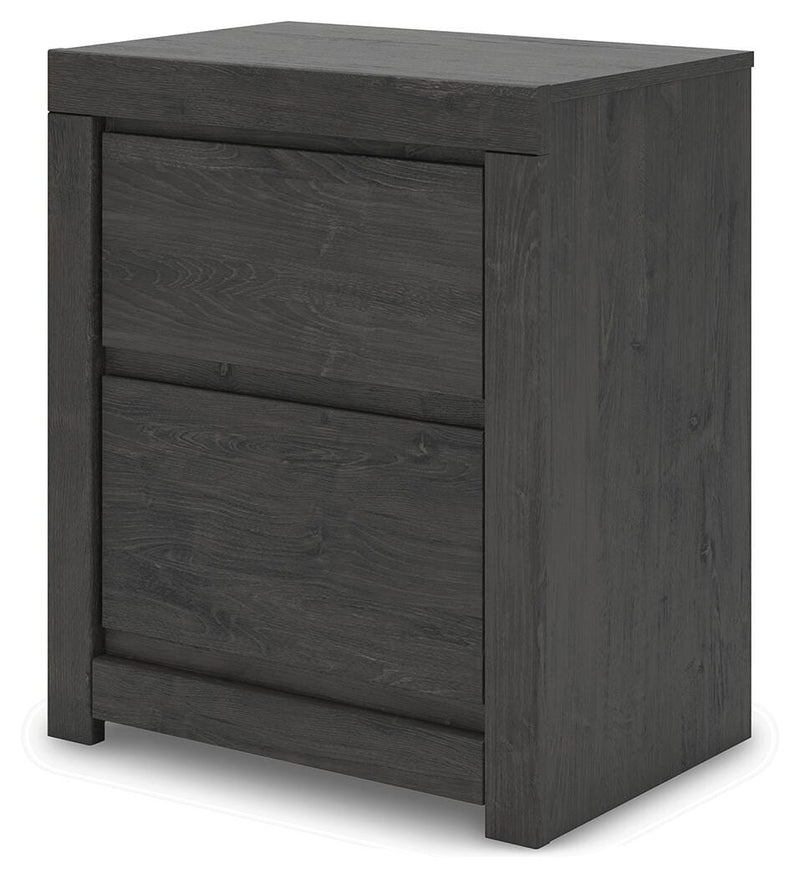 Ashley Furniture Fraluna bedroom set with a bed, matching nightstands, and dresser in a modern bedroom decor.