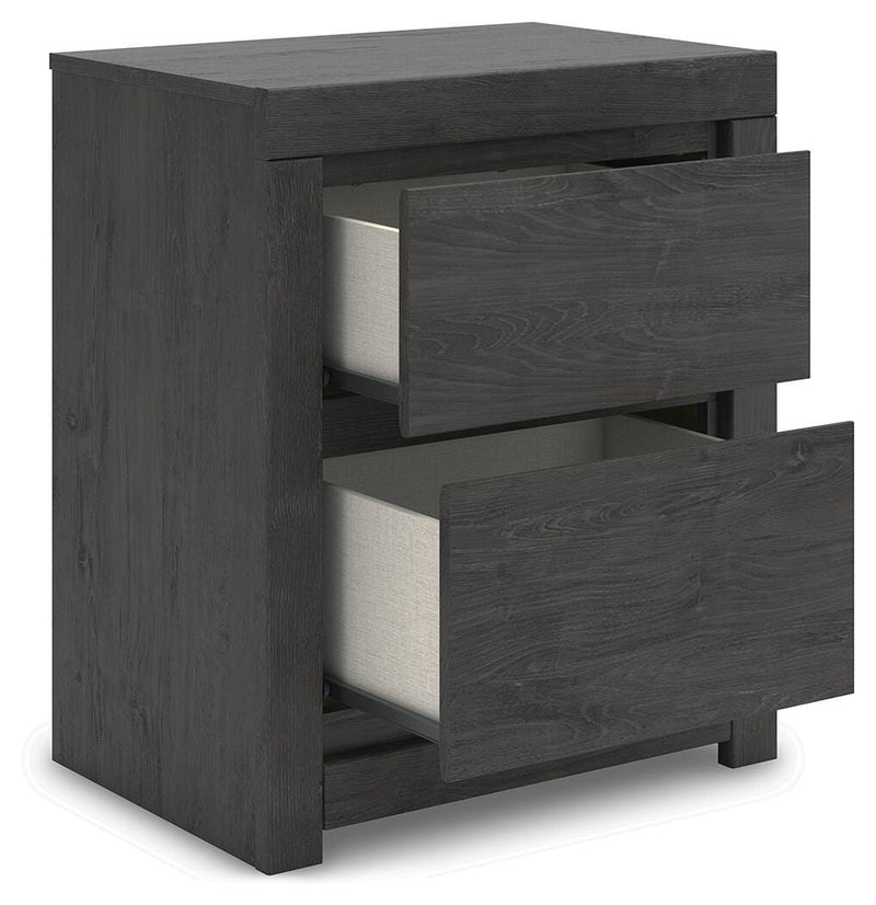 Ashley Furniture Fraluna bedroom set with a bed, nightstands, and dresser, shown from an angled open view for a stylish bedroom look.