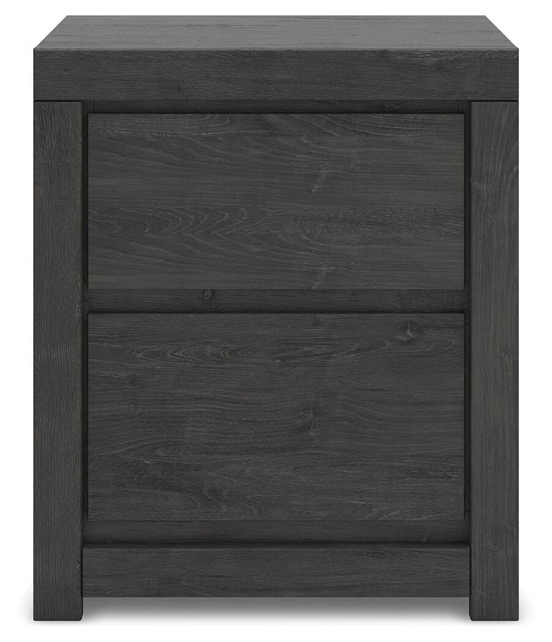 Ashley Furniture Fraluna bedroom set featuring a modern bed frame with a headboard and matching nightstands in a stylish bedroom setup.