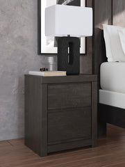 Ashley Furniture Fraluna bedroom set featuring a modern bed frame with matching nightstands and upholstered headboard.