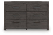 Ashley Furniture Prendonea dresser with sleek wood finish and modern design, featuring multiple drawers for ample storage.