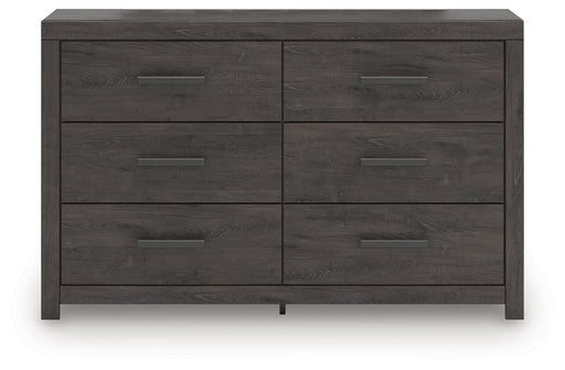 Ashley Furniture Prendonea dresser with sleek wood finish and modern design, featuring multiple drawers for ample storage.