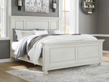 Ashley Furniture Robbinsdale bedroom set with a bed, nightstands, and dresser in a modern, stylish bedroom scene