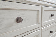 Ashley Furniture Robbinsdale bedroom set with a detailed view of the elegant bed handle and matching bedroom furniture.