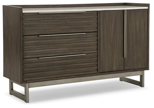 Ashley Furniture Arkenton dresser with multiple drawers and a sleek wood finish, shown from an angled view.