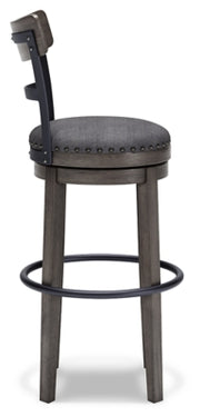 Ashley Furniture Caitbrook bar height barstool with wooden legs and cushioned seat, shown from a side view.