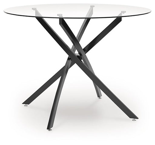 Ashley Furniture Pharwynn dining table shown from an angle, featuring a sleek wood surface and sturdy legs.
