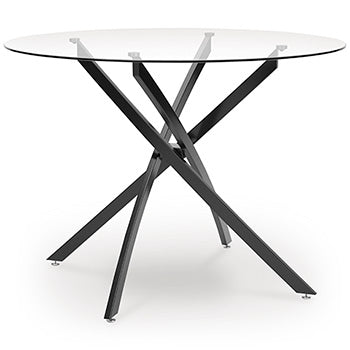 Ashley Furniture Pharwynn dining table with a spacious rectangular wooden top and sturdy legs, shown from an angled view.
