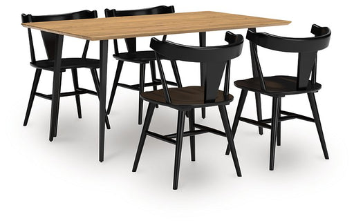 Ashley Furniture Gretlynn dining room set with a wooden table and matching chairs, shown from an angled side view.