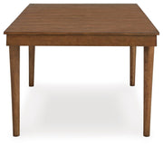 Ashley Furniture Lyncott Dining Extension Table with wooden finish, showing the extended table surface and sturdy legs.
