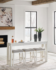 Ashley Furniture Robbinsdale counter height dining table with three matching barstools, featuring a modern wooden design.