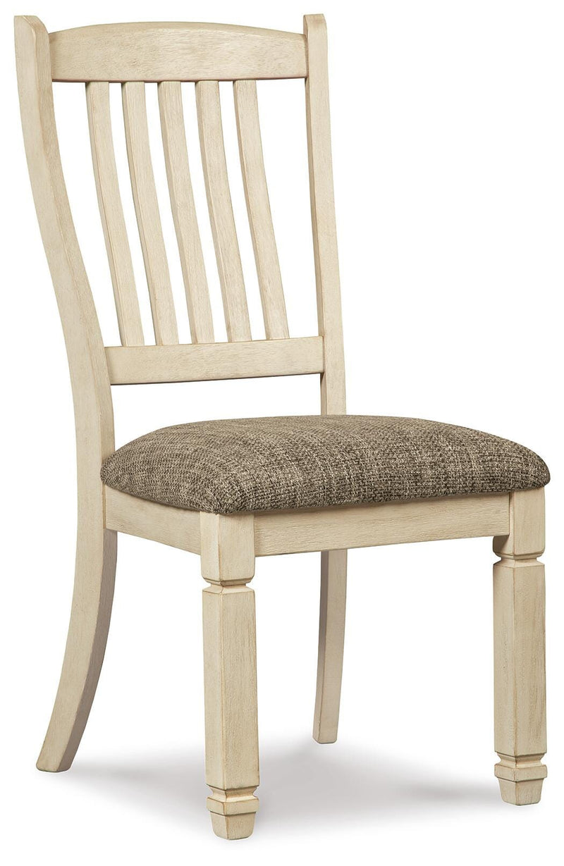 Ashley Furniture Bolanburg dining room set with a rectangular table and matching chairs, showcasing a warm wood finish.