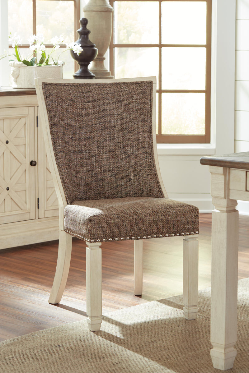 Ashley Furniture Bolanburg dining room set with a wooden table and matching chairs, shown in a modern, elegant dining space.