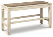 Angle view of Ashley Furniture Bolanburg dining room set with table and six chairs in a modern dining space.
