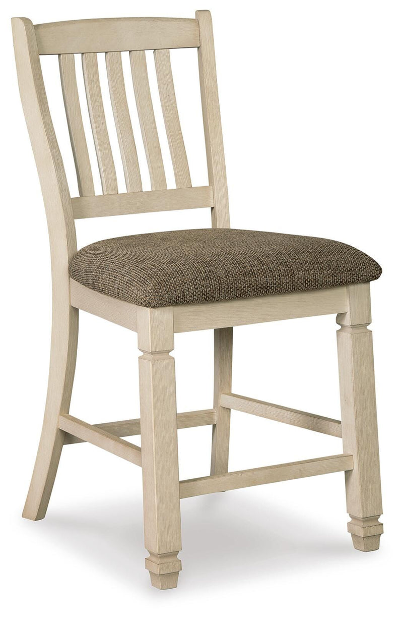 Ashley Furniture Bolanburg dining room set with a wooden table and matching chairs, shown from an angled side view.