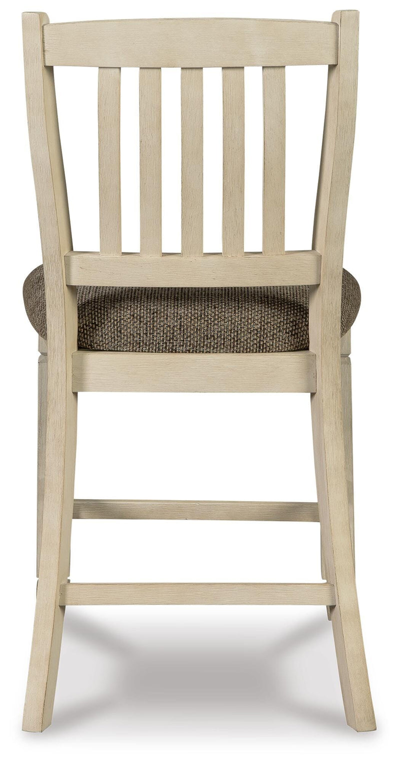 Ashley Furniture Bolanburg dining room set featuring a wooden table and matching chairs in a modern design.