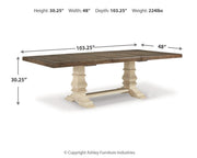 Ashley Furniture Bolanburg dining room set with a rectangular table and six matching chairs, showcasing a warm wood finish.