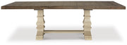 Ashley Furniture Bolanburg dining room set with a wooden table and matching chairs, shown from a head-on angle.