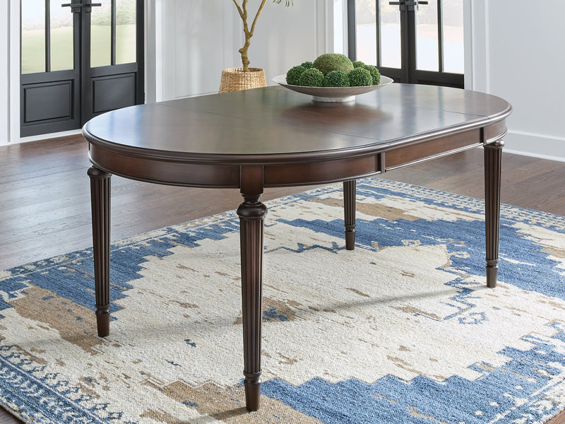 Ashley Furniture Lavinton Dining Extension Table, wooden dining table with extendable leaves and a modern design.