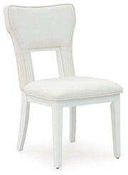 Ashley Furniture Chalanna dining chair with dark wood legs and upholstered cushioned seat, shown from an angled side view.