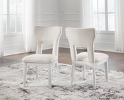 Ashley Furniture Chalanna dining chair with upholstered seat and wooden legs, showcasing modern design and neutral fabric.