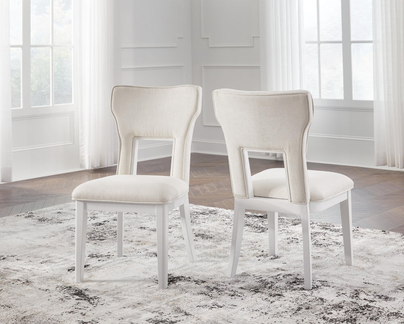 Ashley Furniture Chalanna dining chair with upholstered seat and wooden legs, showcasing modern design and neutral fabric.