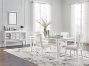Ashley Furniture Chalanna dining room set with a table and six upholstered chairs in a modern design.