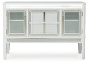 Ashley Furniture Chalanna dining server with LED lighting, featuring a modern wood finish and multiple storage compartments.