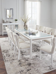 Ashley Furniture Chalanna dining room set with a rectangular table and six matching upholstered chairs, modern wood finish.